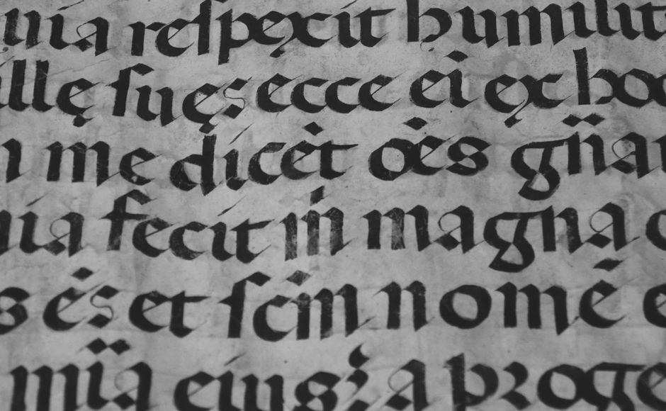 Bible open to Genesis chapter 12 for verse-by-verse commentary and study
