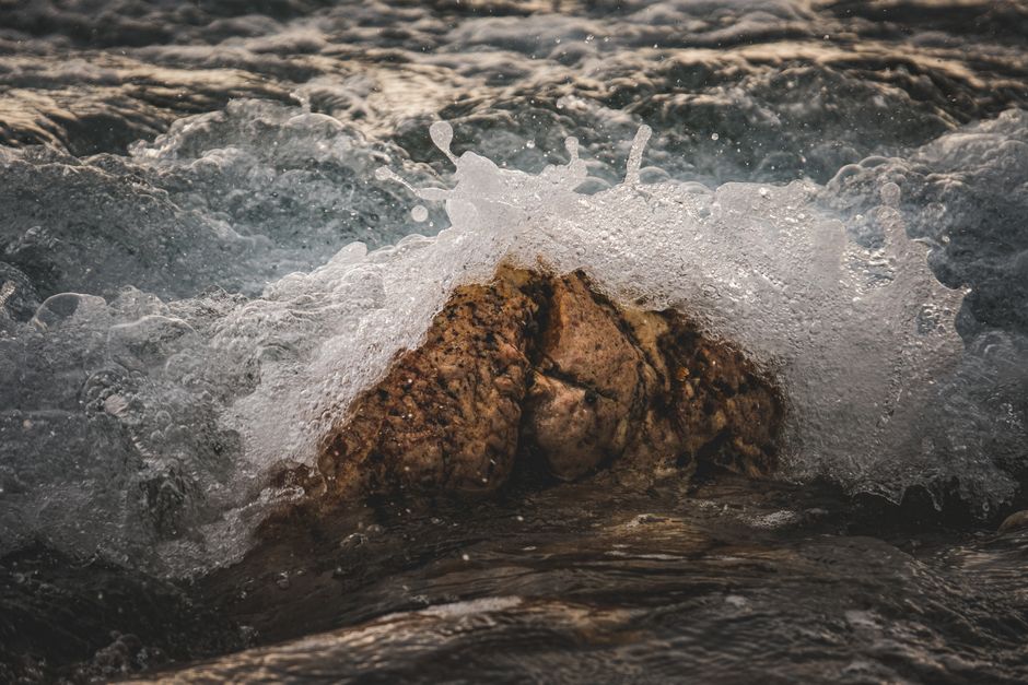 Bible open to Exodus chapter 14 for verse-by-verse commentary and study