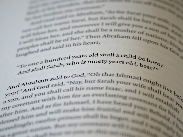 Bible open to Genesis chapter 45 for verse-by-verse commentary and study