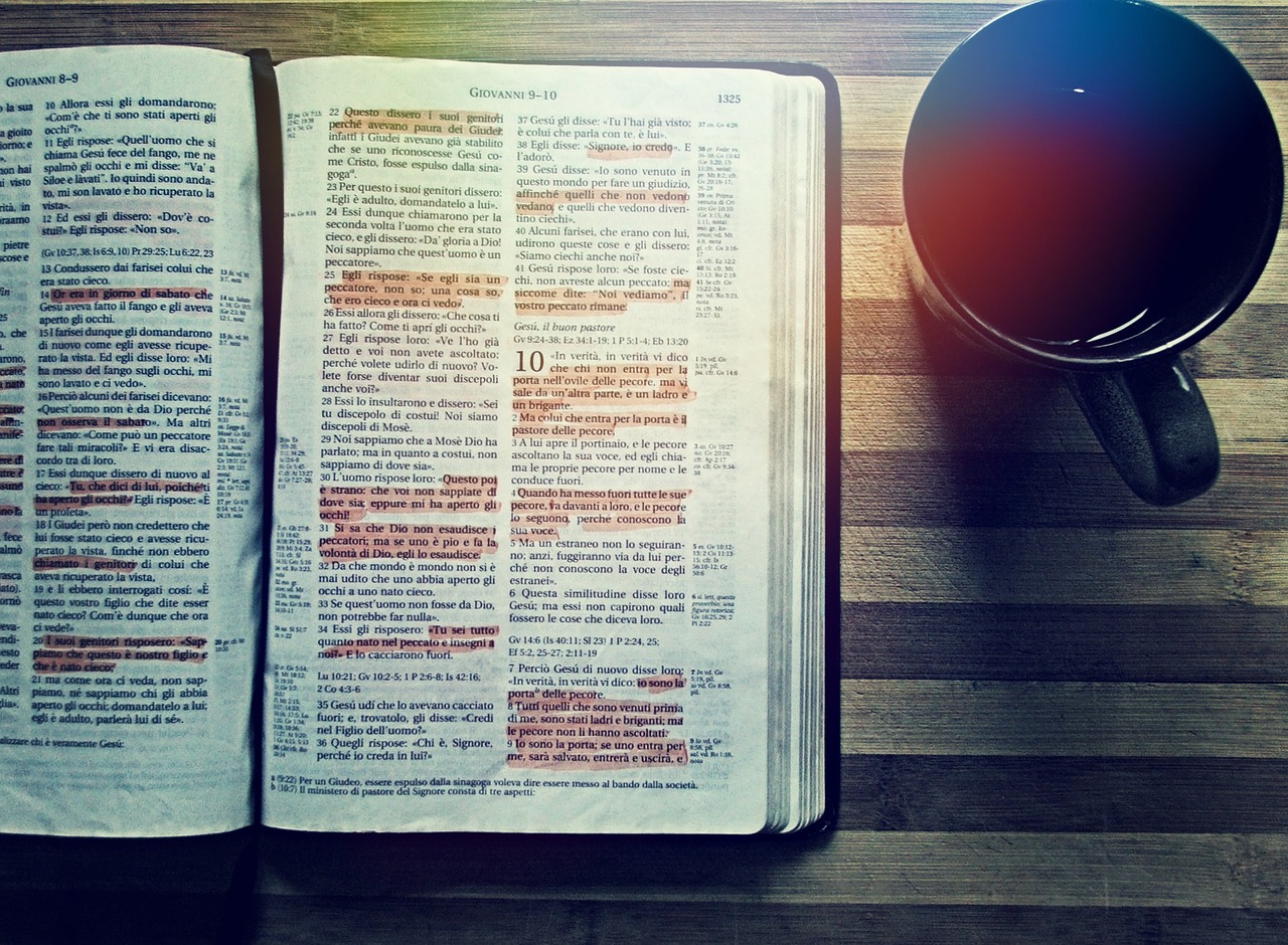 Bible open to Matthew chapter 1 for verse-by-verse commentary and study