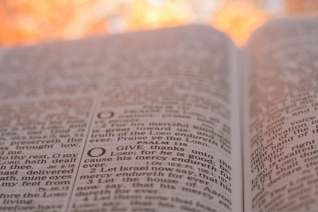 Bible open to Luke chapter 24 for verse-by-verse commentary and study