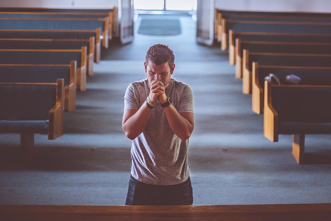 Bible open to Jude chapter 1 for verse-by-verse commentary and study