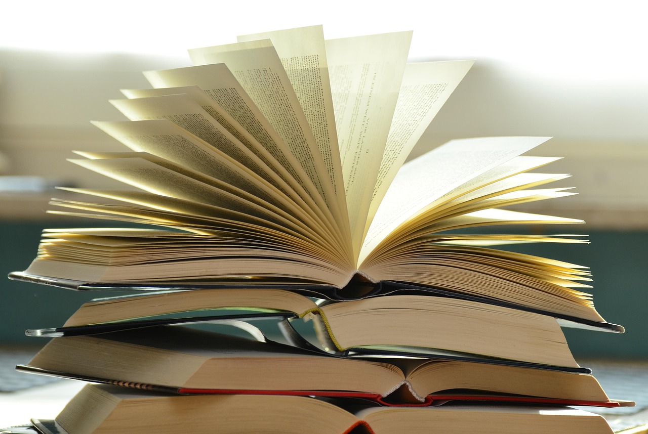 Bible open to Luke chapter 5 for verse-by-verse commentary and study