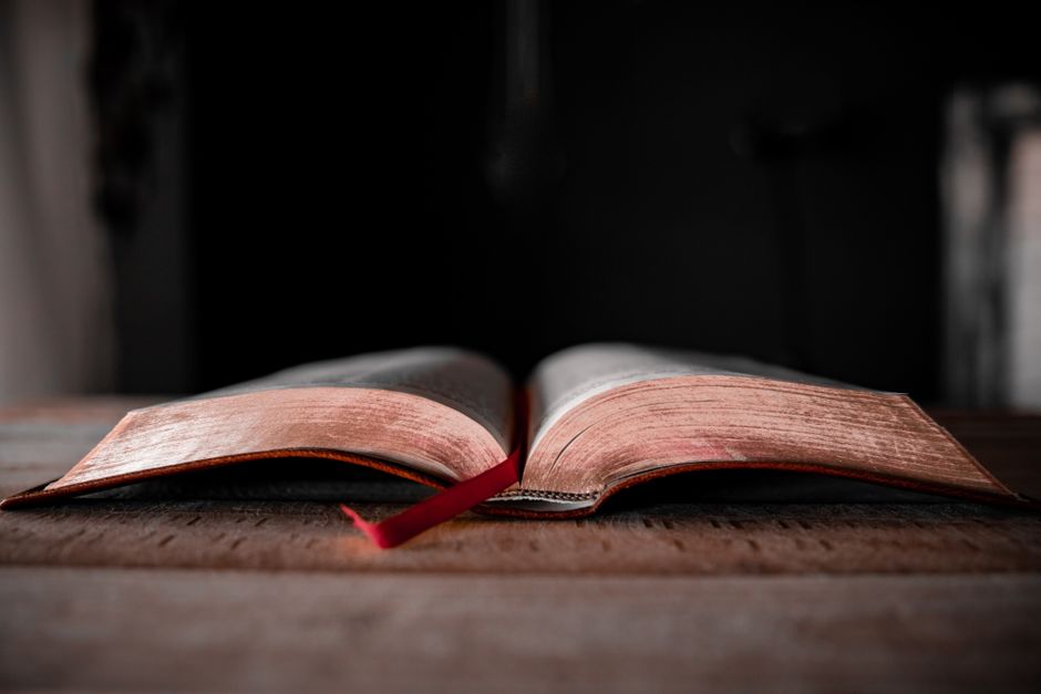 Bible open to Nehemiah chapter 8 for verse-by-verse commentary and study