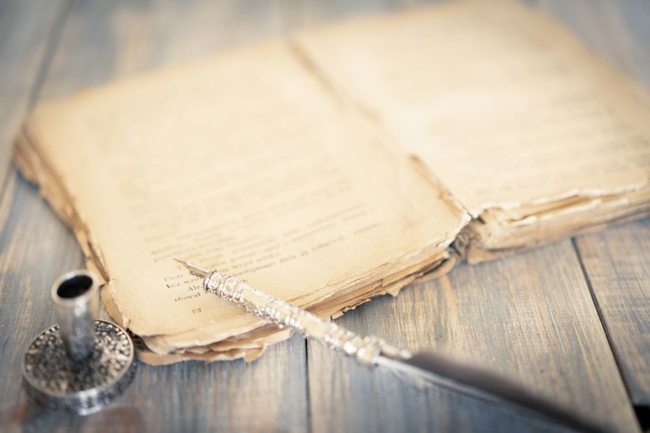 Bible open to Luke chapter 1 for verse-by-verse commentary and study