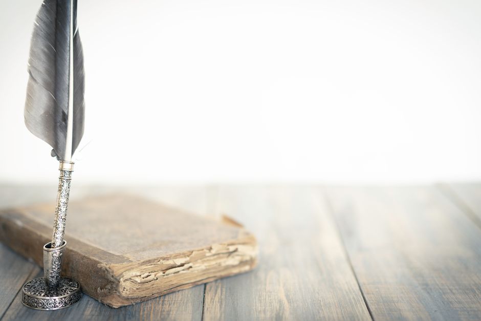 Bible open to Proverbs chapter 25 for verse-by-verse commentary and study