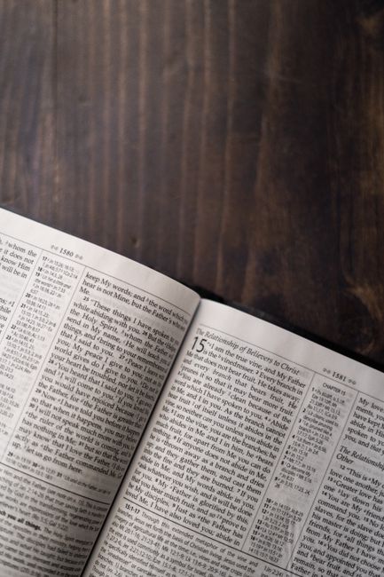 Bible open to 2 Chronicles chapter 20 for verse-by-verse commentary and study
