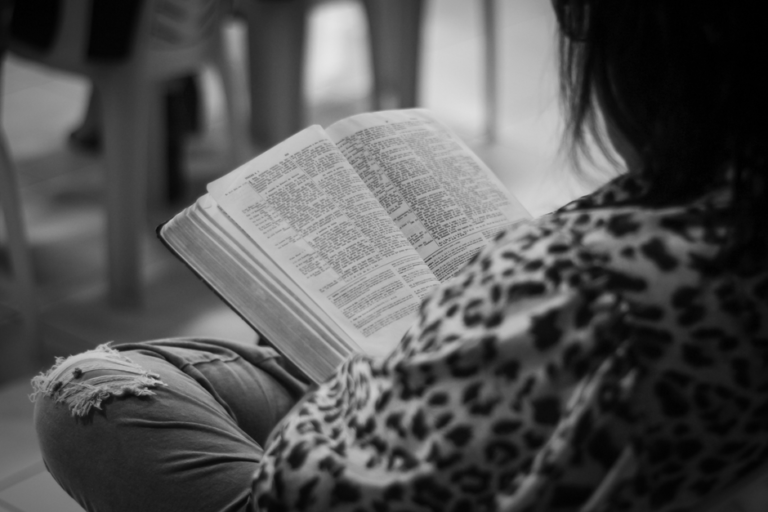 Bible open to Philippians chapter 3 for verse-by-verse commentary and study