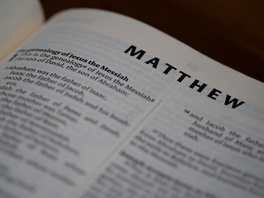 Bible open to Jonah chapter 4 for verse-by-verse commentary and study