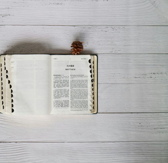 Bible open to Matthew chapter 2 for verse-by-verse commentary and study