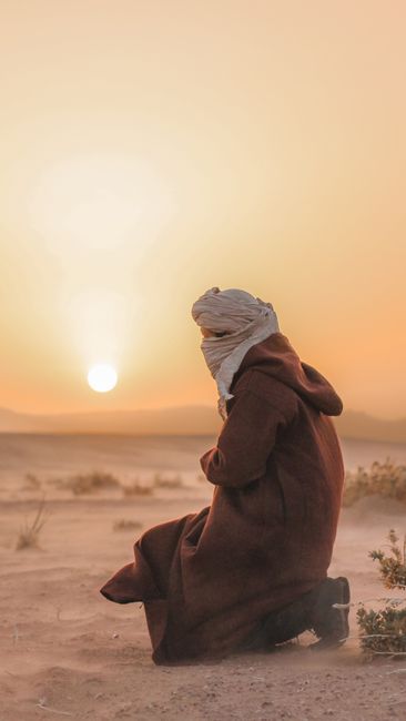 Bible open to Isaiah chapter 41 for verse-by-verse commentary and study