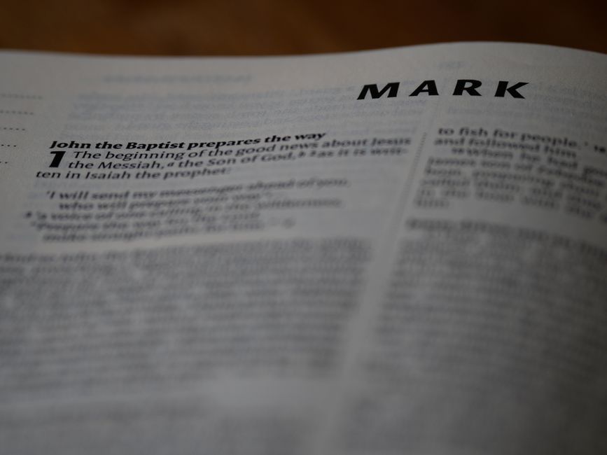 Bible open to 1 John chapter 3 for verse-by-verse commentary and study