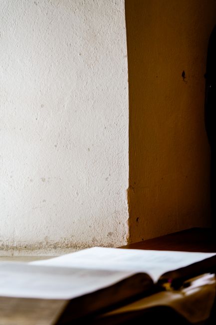 Bible open to John chapter 12 for verse-by-verse commentary and study