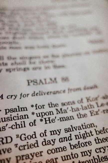 Bible open to Psalm chapter 20 for verse-by-verse commentary and study