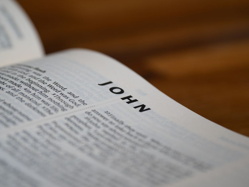 Bible open to John chapter 2 for verse-by-verse commentary and study