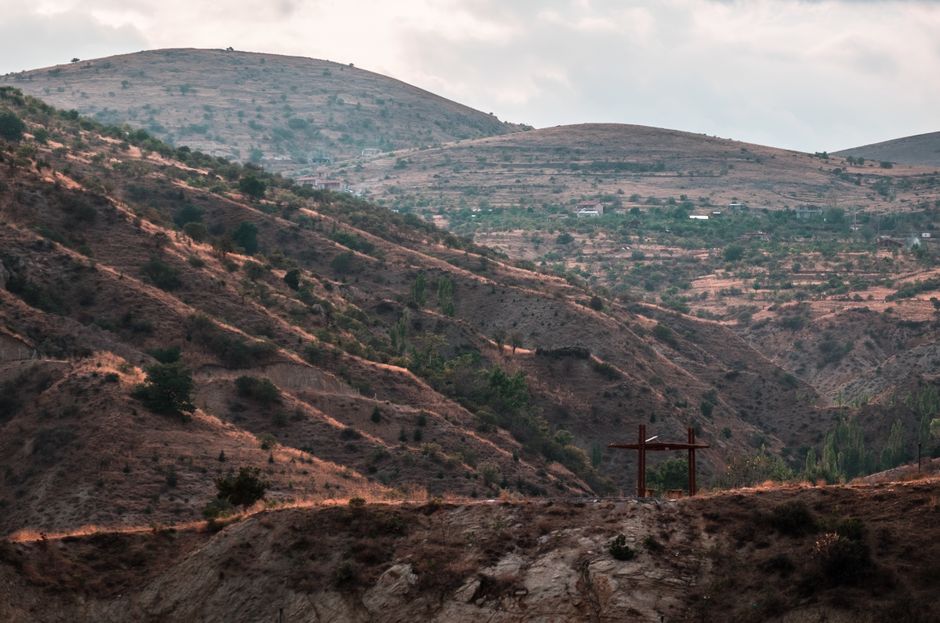 Bible open to Romans chapter 6 for verse-by-verse commentary and study