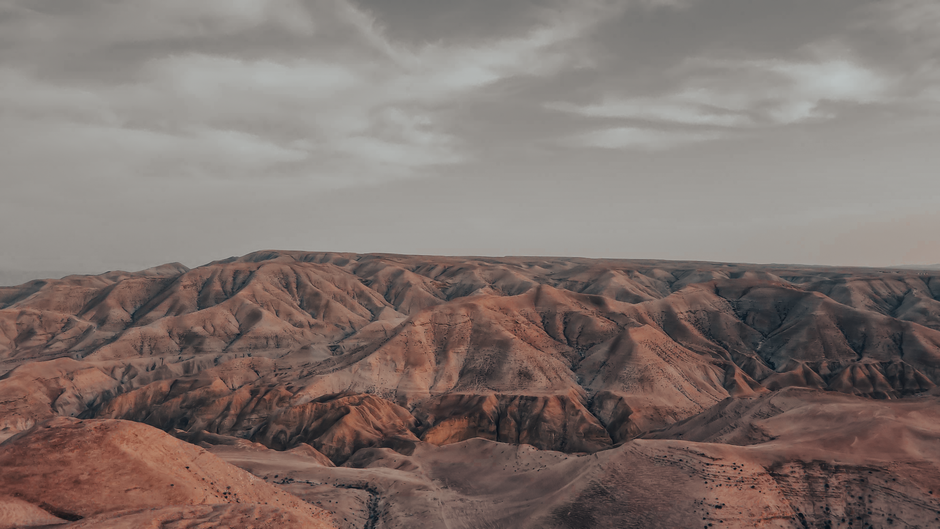 Bible open to Matthew chapter 4 for verse-by-verse commentary and study