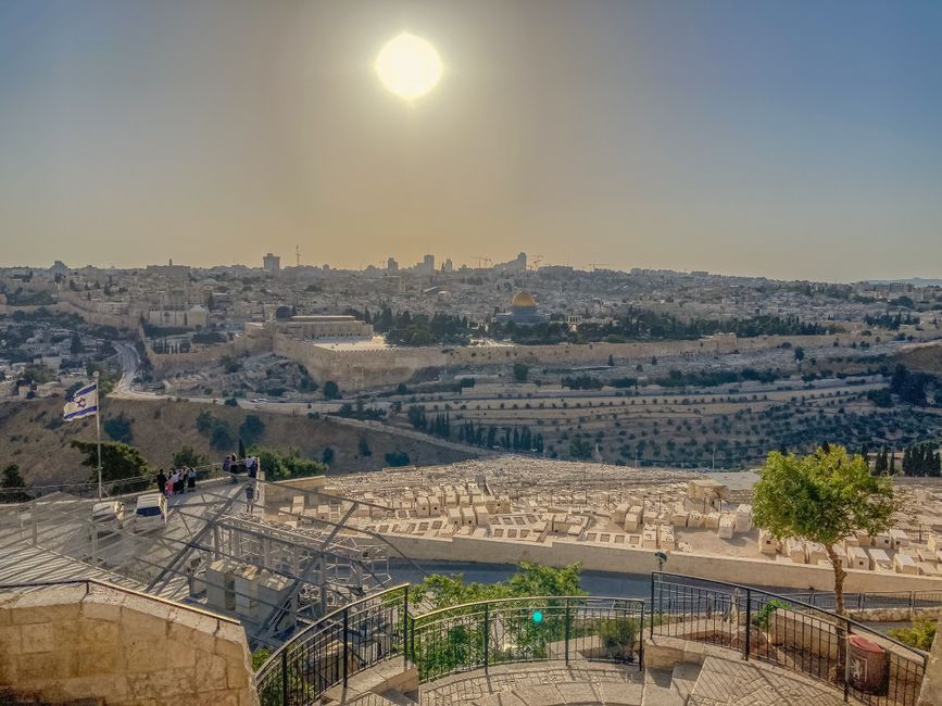 Bible open to John chapter 12 for verse-by-verse commentary and study
