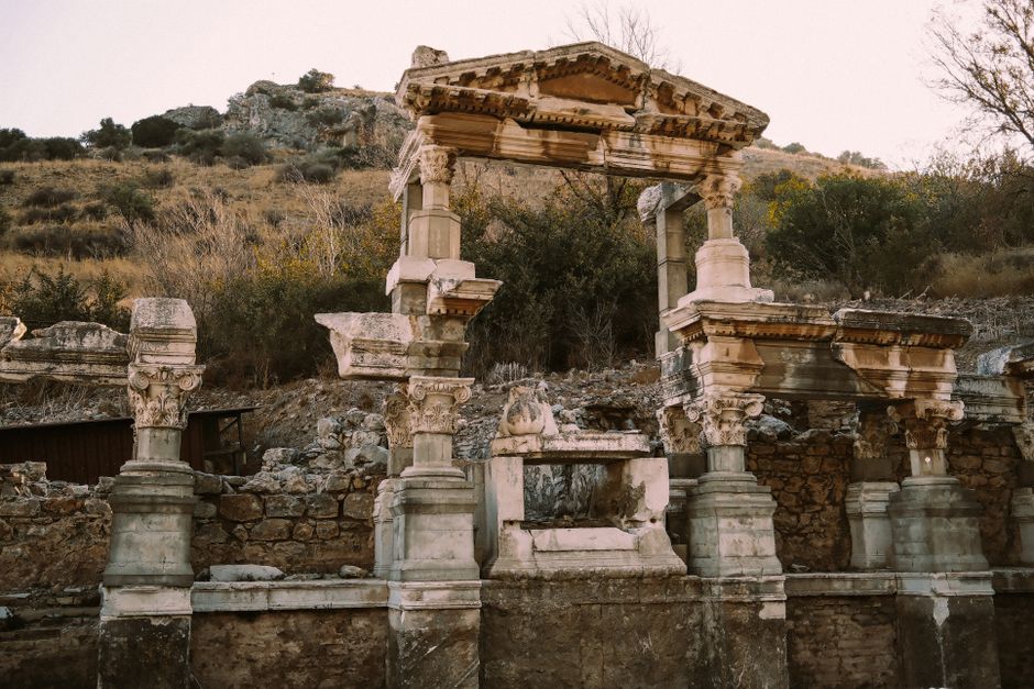 Bible open to Romans chapter 6 for verse-by-verse commentary and study