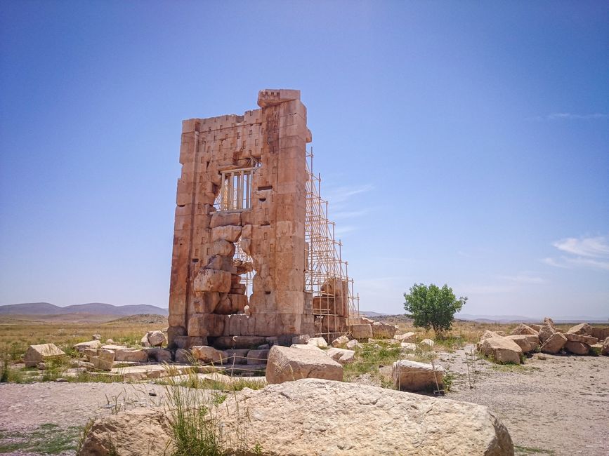 Bible open to Isaiah chapter 45 for verse-by-verse commentary and study