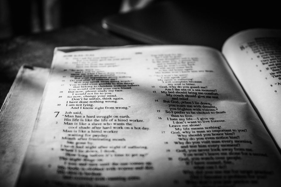 Bible open to Proverbs chapter 20 for verse-by-verse commentary and study
