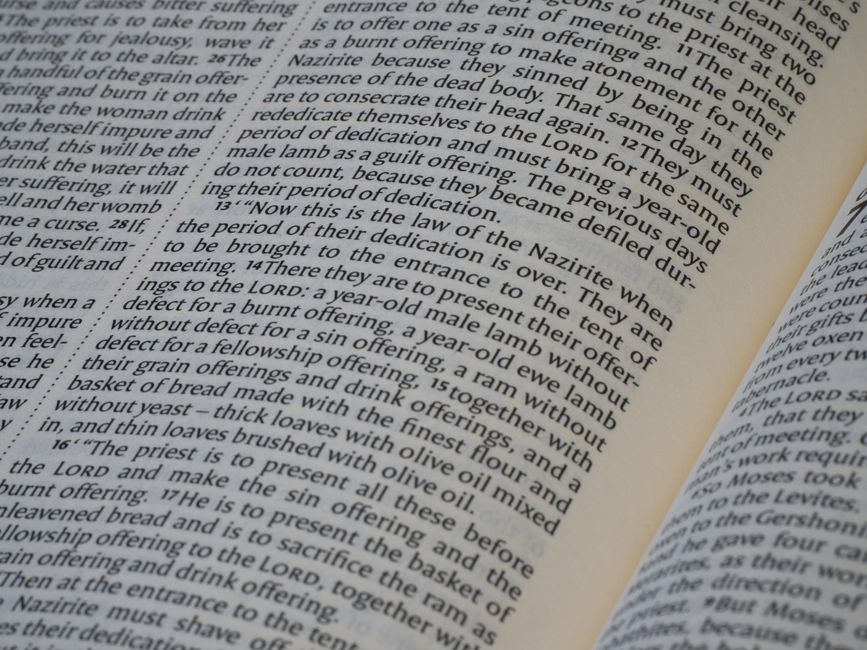 Bible open to 1 Corinthians chapter 2 for verse-by-verse commentary and study