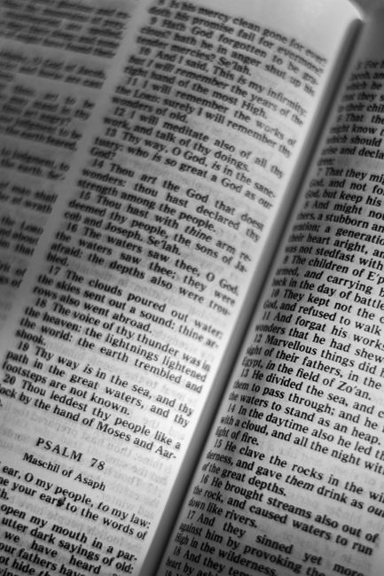 Bible open to Psalm chapter 100 for verse-by-verse commentary and study