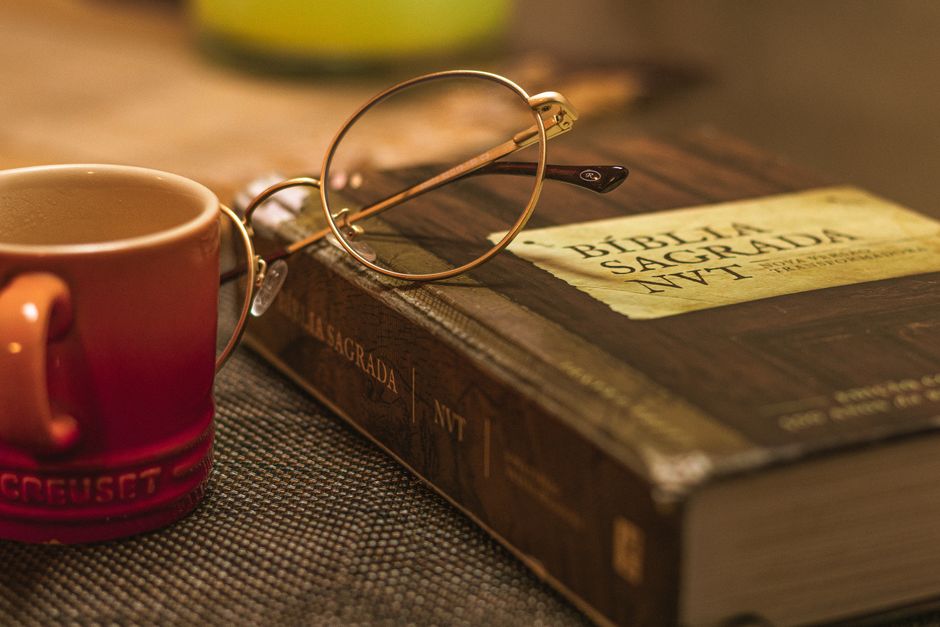 Bible open to Romans chapter 13 for verse-by-verse commentary and study