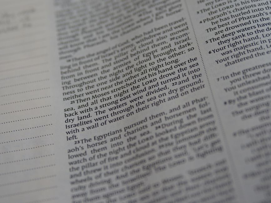 Bible open to Hebrews chapter 12 for verse-by-verse commentary and study