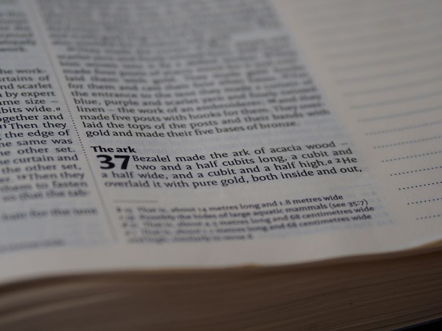 Bible open to Jonah chapter 2 for verse-by-verse commentary and study