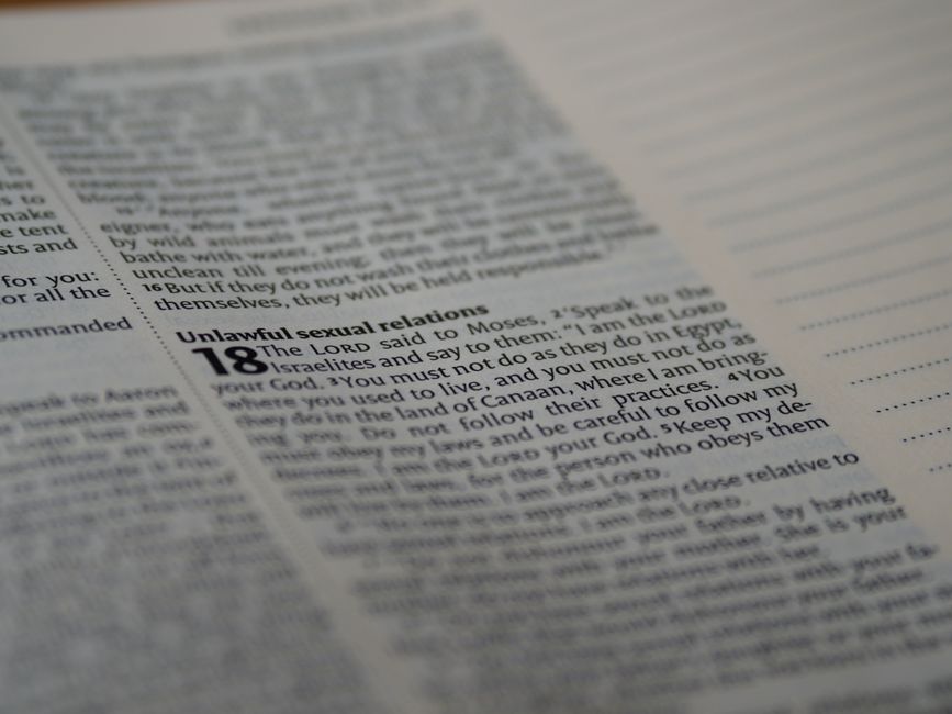 Bible open to Matthew chapter 25 for verse-by-verse commentary and study