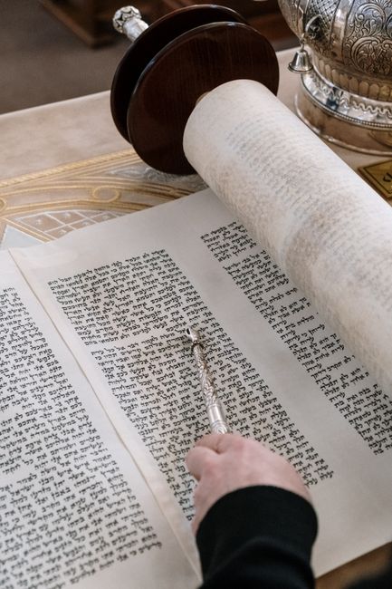 Bible open to Daniel chapter 9 for verse-by-verse commentary and study