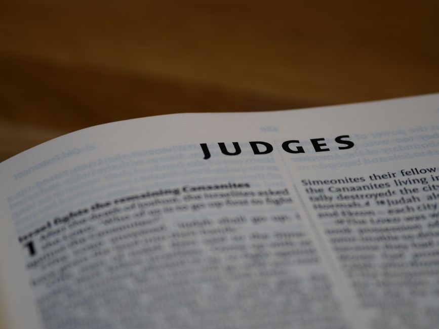 Bible open to Judges chapter 6 for verse-by-verse commentary and study