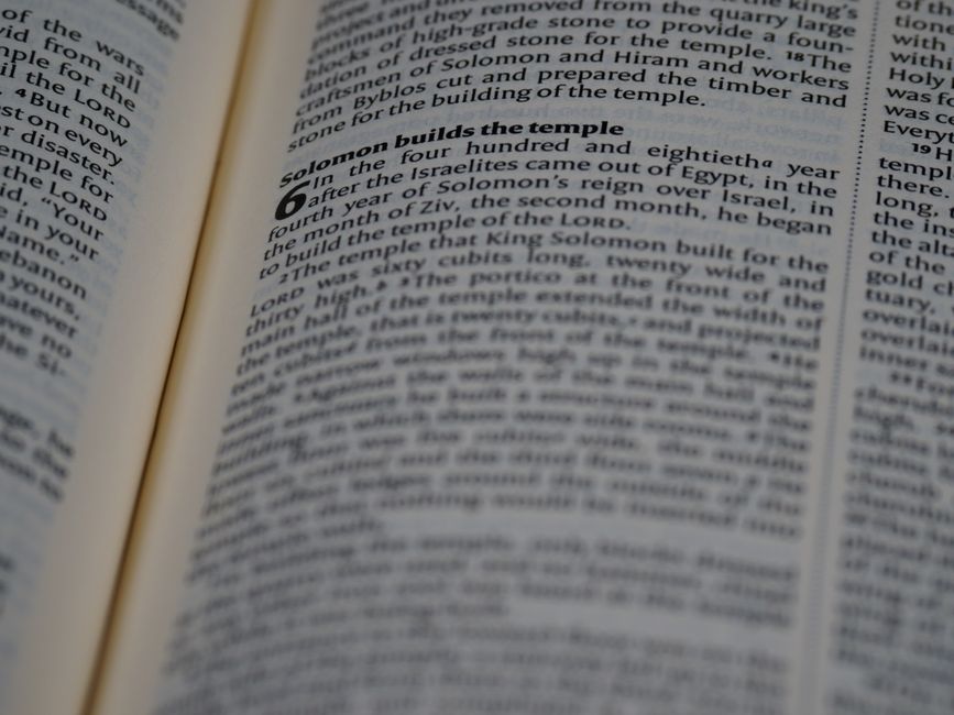 Bible open to Romans chapter 2 for verse-by-verse commentary and study