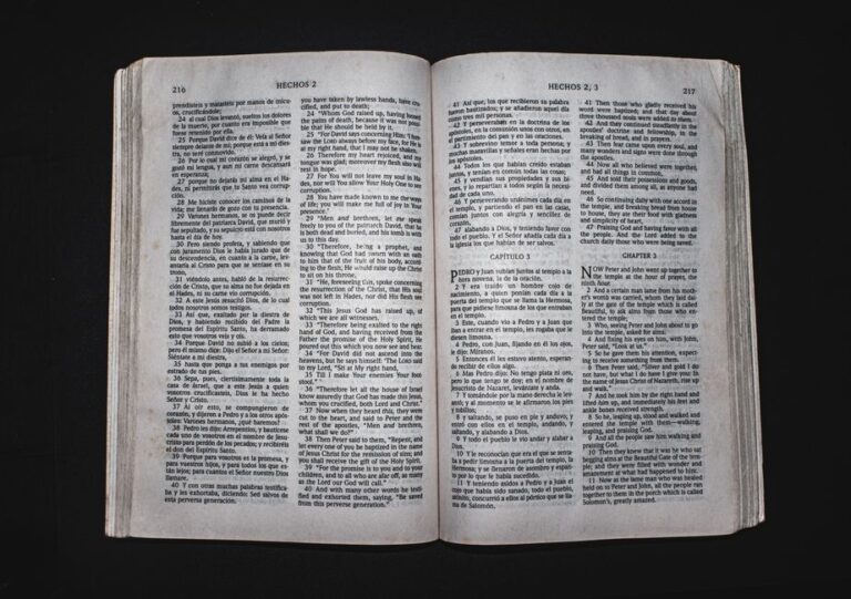 Bible open to Acts chapter 5 for verse-by-verse commentary and study