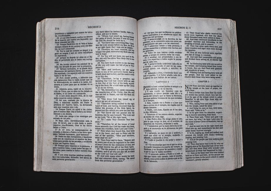 Bible open to Acts chapter 5 for verse-by-verse commentary and study