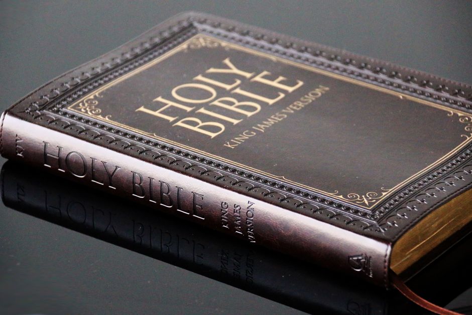 Bible open to James chapter 5 for verse-by-verse commentary and study