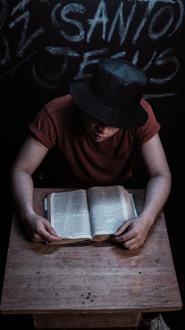 Bible open to 1 Peter chapter 4 for verse-by-verse commentary and study