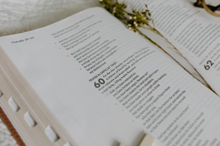 Bible open to Psalm chapter 40 for verse-by-verse commentary and study