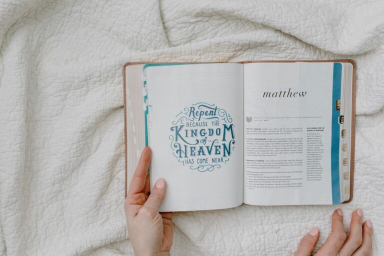 Bible open to Matthew chapter 22 for verse-by-verse commentary and study