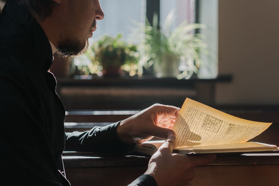 Bible open to Psalm chapter 130 for verse-by-verse commentary and study