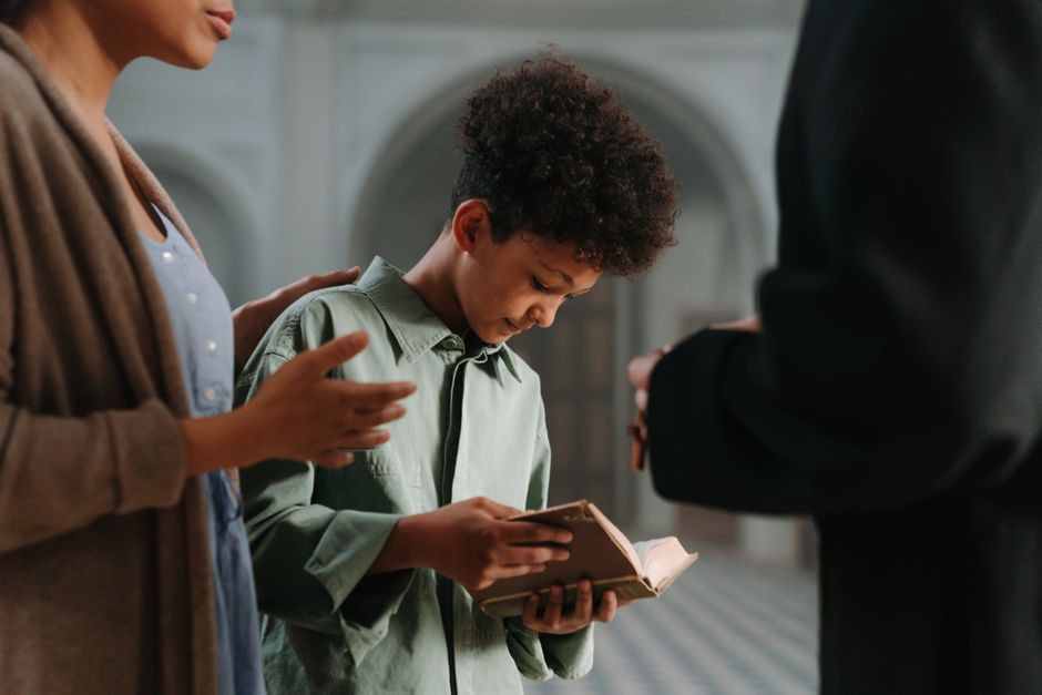 Bible open to Matthew chapter 22 for verse-by-verse commentary and study